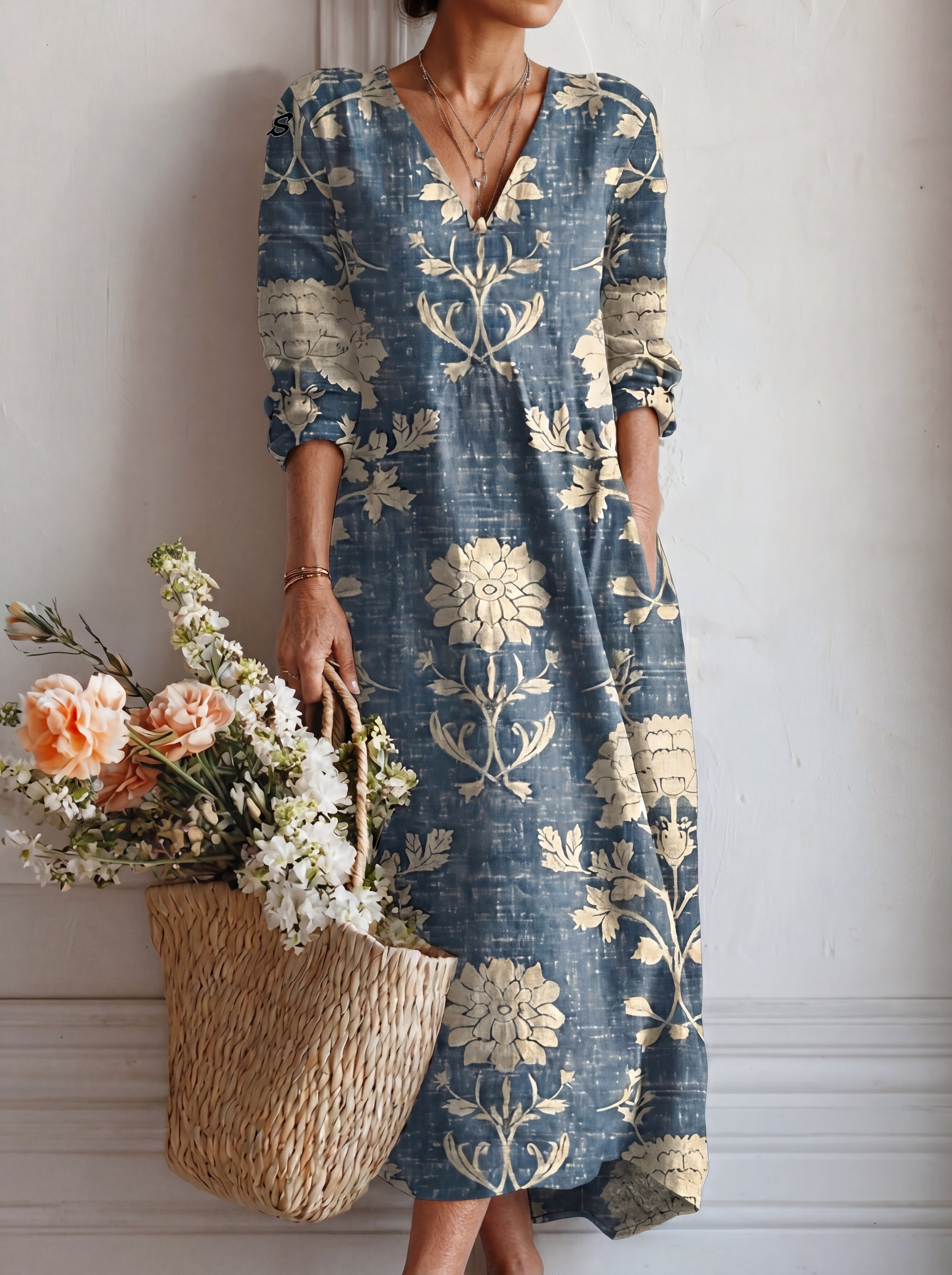 Vestido casual de mezclilla para mujer de corte amplio, con cuello de solapa y mangas cortas.